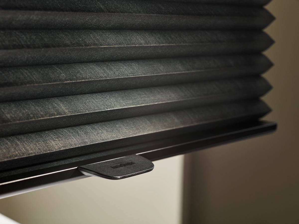 what-you-need-to-know-about-custom-blinds-and-shades -1200px Black custom shades hanging on a window in a Spearfish, SD, home.