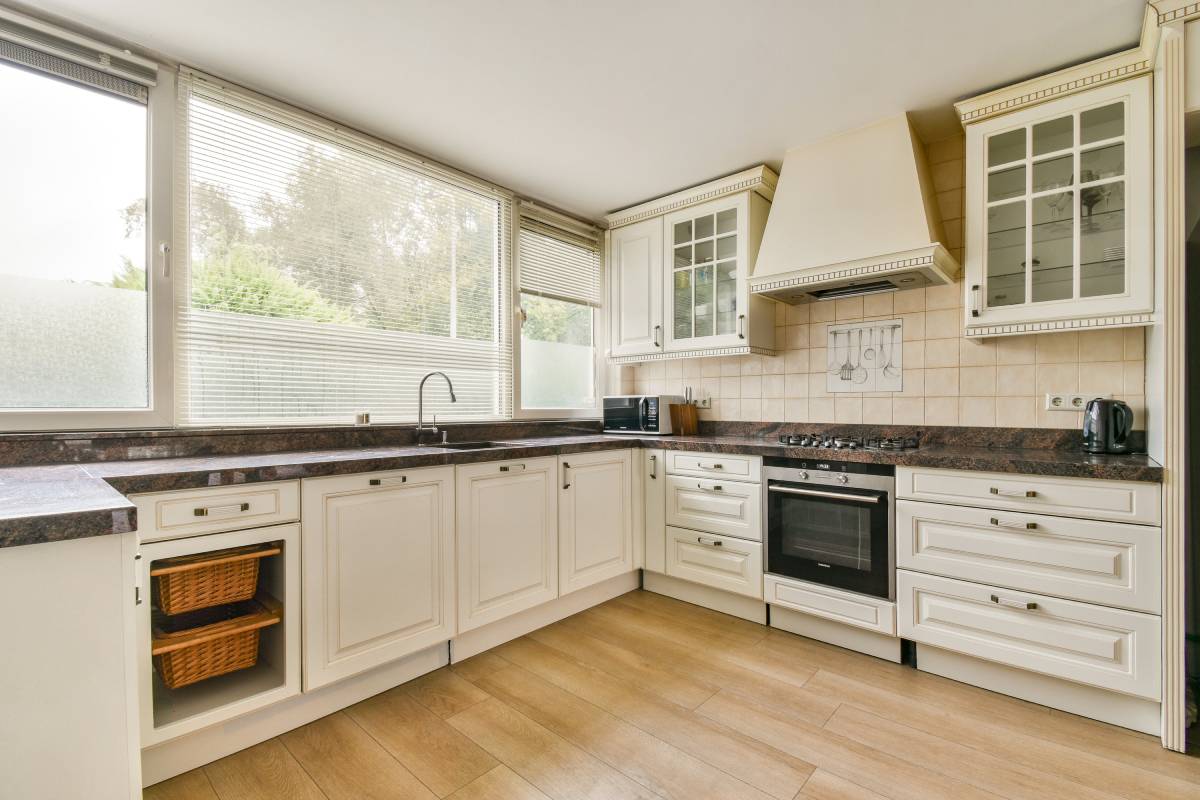Custom kitchen blinds covering multiple kitchen windows